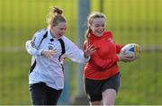 26 February 2014; Kaitlin Dutton, from St. Dominic's, in action against Abhia Finegan, from Caritas College, during the Dublin Girls Give It a Try Blitz. Templeogue United / St. Judes GAA Grounds, Dublin. Picture credit: Matt Browne / SPORTSFILE
