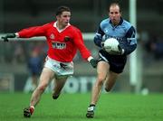 27 October 1996; Brian Stynes of Dublin in action against Paul McGrane of Armagh during the Church & General National Football League Division 2 match between Dublin and Armagh at Parnell Park in Dublin. Photo by Ray McManus/Sportsfile