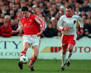 16 April 1999; Colin Hawkins of St Patrick's Athletic in action against Pat Morley of Cork City during the Harp Lager National League Premier Division match between St Patrick's Athletic and Cork City at Richmond Park in Dublin. Photo by Brendan Moran/Sportsfile