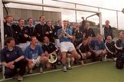 24 April 1999; The Cork Church of Ireland team celebrate with the cup after the Nissan Irish Senior Men's Hockey Cup Final match between Cork Church of Ireland and Three Rock Rovers at the National Hockey Stadium in Belfield, Dublin. Photo by David Maher/Sportsfile
