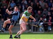 10 April 1999; Daithi Regan of Offaly in action against Barry O'Sullivan of Dublin during the Church & General National Hurling League Division 1A match between Offaly and Dublin at St Brendan's Park in Birr, Offaly. Photo by Ray McManus/Sportsfile