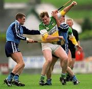 10 April 1999; Daithi Regan of Offaly in action against Barry O'Sullivan, left, and Liam Walsh of Dublin during the Church & General National Hurling League Division 1A match between Offaly and Dublin at St Brendan's Park in Birr, Offaly. Photo by Ray McManus/Sportsfile