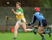 10 April 1999; Daithi Regan of Offaly in action against Darragh Spain of Dublin during the Church & General National Hurling League Division 1A match between Offaly and Dublin at St Brendan's Park in Birr, Offaly. Photo by Ray McManus/Sportsfile
