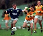 11 April 1999; Dara O'Cinneide of Kerry in action against Mark O'Reilly of Meath during the Church & General National Football League Division 1 Quarter-Final match between Kerry and Meath at the Gaelic Grounds in Limerick. Photo by Brendan Moran/Sportsfile