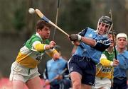 10 April 1999; David Sweeney of Dublin in action against Michael Duignan of Offaly during the Church & General National Hurling League Division 1A match between Offaly and Dublin at St Brendan's Park in Birr, Offaly. Photo by Ray McManus/Sportsfile