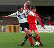 14 March 1999; David Ward of Dundalk in action against Gareth Cronin of Cork City during the Harp Lager National League Premier Division match between Cork City and Dundalk at Turners Cross in Cork. Photo by David Maher/Sportsfile