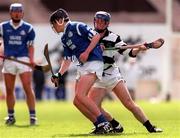 18 April 1999; Declan Walsh of St Flannan's in action against Eoin Kelly of St Kieran's during GAA All-Ireland Post Primary Senior A Schools Hurling Croke Cup Final match between St Flannan's Ennis, Clare and St Kieran's Kilkenny at Croke Park in Dublin. Photo by Matt Browne/Sportsfile