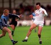 11 April 1999; Derek Maher of Kildare in action against Declan Darcy of Dublin during the Church and General National Football League Quarter-Final match between Dublin and Kildare at Croke Park in Dublin. Photo by Damien Eagers/Sportsfile
