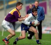 18 April 1999; Derry O'Brien of St Jarlath's in action against Philip Doyle of Good Counsel during GAA All-Ireland Post Primary Senior A Schools Football Hogan Cup Final match between St Jarlath's Tuam, Galway and Good Counsel New Ross, Wexford at Croke Park in Dublin. Photo by Ray Lohan/Sportsfile