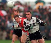 11 April 1999; Dessie Sloyane of Sligo in action against Kieran McGeeney of Armagh during the Church and General National Football League Quarter-Final match between Armagh and Sligo at Pearse Park in Longford. Photo by Matt Browne/Sportsfile