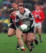 11 April 1999; Dessie Sloyane of Sligo in action against Kieran McGeeney of Armagh during the Church and General National Football League Quarter-Final match between Armagh and Sligo at Pearse Park in Longford. Photo by Matt Browne/Sportsfile