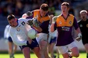 18 April 1999; Diarmuid Blake of St Jarlath's in action against Keith Madigan and Eric Bradley of Good Counsel during GAA All-Ireland Post Primary Senior A Schools Football Hogan Cup Final match between St Jarlath's Tuam, Galway and Good Counsel New Ross, Wexford at Croke Park in Dublin. Photo by Matt Browne/Sportsfile