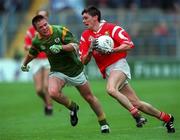 25 April 1999; Don Davis of Cork in action against Mark O'Reilly of Meath during the Church and General National Football League Semi-Final match between Cork and Meath at Croke Park in Dublin. Photo by Damien Eagers/Sportsfile