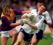 18 April 1999; Enda Trench of St Jarlath's in action against Barry Byrne of Good Counsel during GAA All-Ireland Post Primary Senior A Schools Football Hogan Cup Final match between St Jarlath's Tuam, Galway and Good Counsel New Ross, Wexford at Croke Park in Dublin. Photo by Matt Browne/Sportsfile