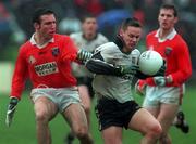 11 April 1999; Gerry McGowan of Sligo in action against Enda McNulty of Armagh during the Church and General National Football League Quarter-Final match between Armagh and Sligo at Pearse Park in Longford. Photo by Matt Browne/Sportsfile
