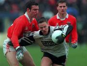 11 April 1999; Gerry McGowan of Sligo in action against Enda McNulty of Armagh during the Church and General National Football League Quarter-Final match between Armagh and Sligo at Pearse Park in Longford. Photo by Matt Browne/Sportsfile