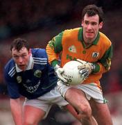 11 April 1999; Hank Traynor of Meath in action against Seamus Moynihan of Kerry during the Church & General National Football League Division 1 Quarter-Final match between Kerry and Meath at the Gaelic Grounds in Limerick. Photo by Brendan Moran/Sportsfile