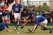 24 April 1999; Gordon Elliott of Three Rock Rovers in action against Andrew Chambers of Cork Church of Ireland during the Nissan Irish Senior Men's Hockey Cup Final match between Cork Church of Ireland and Three Rock Rovers at the National Hockey Stadium in Belfield, Dublin. Photo by David Maher/Sportsfile