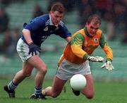 11 April 1999; Billy O'Shea of Kerry in action against John McDermott of Meath during the Church & General National Football League Division 1 Quarter-Final match between Kerry and Meath at the Gaelic Grounds in Limerick. Photo by Brendan Moran/Sportsfile