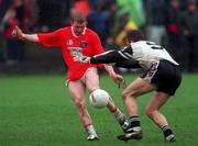 11 April 1999; John Rafferty of Armagh in action against Eamonn O'Hara of Sligo during the Church and General National Football League Quarter-Final match between Armagh and Sligo at Pearse Park in Longford. Photo by Matt Browne/Sportsfile