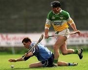 10 April 1999; Liam Walsh of Dublin in action against Billy Dooley of Offaly during the Church & General National Hurling League Division 1A match between Offaly and Dublin at St Brendan's Park in Birr, Offaly. Photo by Ray McManus/Sportsfile
