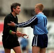 11 April 1999; Referee Michael Curley speaks to Declan Darcy of Dublin during the Church and General National Football League Quarter-Final match between Dublin and Kildare at Croke Park in Dublin. Photo by Ray McManus/Sportsfile