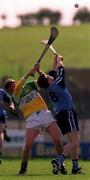 10 April 1999; Martin Hanamy of Offaly in action against Michael Fitzsimons of Dublin during the Church & General National Hurling League Division 1A match between Offaly and Dublin at St Brendan's Park in Birr, Offaly. Photo by Ray McManus/Sportsfile