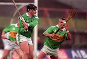 11 April 1999; Mike Fitzgerald of Limerick in action against Seamus McIntyre of Kerry during the Church & General National Hurling League Division 1A match between Limerick and Kerry at the Gaelic Grounds in Limerick. Photo by Aoife Rice/Sportsfile