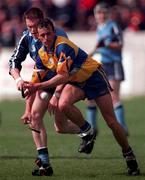 18 April 1999; PJ O'Connell of Clare in action against Barry O'Sullivan of Dublin during the Church and General National Hurling League Division 1A match between Dublin and Clare at Parnell Park in Dublin. Photo by Damien Eagers/Sportsfile