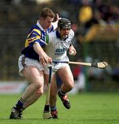 18 April 1999; Paul Flynn of Waterford in action against Conor Gleeson of Tipperary during the Church and General National Hurling League Division 1B match between Tipperary and Waterford at Semple Stadium in Thurles, Tipperary. Photo by Brendan Moran/Sportsfile