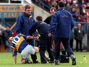 18 April 1999; Paul Ormonde of Tipperary is attended to by medical personnel watched by Tipperary manager Nicky English during the Church and General National Hurling League Division 1B match between Tipperary and Waterford at Semple Stadium in Thurles, Tipperary. Photo by Aoife Rice/Sportsfile