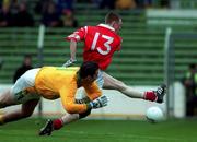 25 April 1999; Philip Clifford of Cork shoots past Meath goalkeeper Cormac Sullivan during the Church and General National Football League Semi-Final match between Cork and Meath at Croke Park in Dublin. Photo by Aoife Rice/Sportsfile