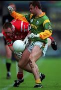 25 April 1999; Philip Clifford of Cork is tackled by Cormac Murphy of Meath during the Church and General National Football League Semi-Final match between Cork and Meath at Croke Park in Dublin. Photo by Ray McManus/Sportsfile