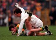 28 March 1999; Richard Kealy of Meath is tackled by Derek Maher of Kildare during the Church and General National Football League Division 1 match between Meath and Kildare at Páirc Tailteann in Navan, Meath. Photo by Ray McManus/Sportsfile