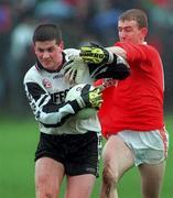 11 April 1999; Ronan Keane of Sligo in action against John Rafferty of Armagh during the Church and General National Football League Quarter-Final match between Armagh and Sligo at Pearse Park in Longford. Photo by Matt Browne/Sportsfile