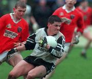 11 April 1999; Ronan Keane of Sligo in action against John Rafferty of Armagh during the Church and General National Football League Quarter-Final match between Armagh and Sligo at Pearse Park in Longford. Photo by Matt Browne/Sportsfile