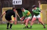 11 April 1999; Seamus McIntyre of Kerry in action against Mike Fitzgerald of Limerick during the Church & General National Hurling League Division 1A match between Limerick and Kerry at the Gaelic Grounds in Limerick. Photo by Aoife Rice/Sportsfile