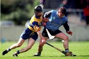 18 April 1999; Brian Minogue of Clare in action against Sean Duignan of Dublin during the Church and General National Hurling League Division 1A match between Dublin and Clare at Parnell Park in Dublin. Photo by Damien Eagers/Sportsfile