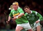 11 April 1999; Tom O'Connell of Kerry in action against Ciaran Carey of Limerick during the Church & General National Hurling League Division 1A match between Limerick and Kerry at the Gaelic Grounds in Limerick. Photo by Brendan Moran/Sportsfile
