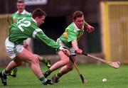 11 April 1999; Tony Maunsell of Kerry in action against Mark Foley of Limerick during the Church & General National Hurling League Division 1A match between Limerick and Kerry at the Gaelic Grounds in Limerick. Photo by Aoife Rice/Sportsfile