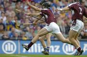 31 July 2005; Tommy Dunne, Tipperary, scores his sides first goal despite the attentions of Shane Kavanagh and Damien Joyce (2), Galway. Guinness All-Ireland Hurling Championship, Quarter-Final, Galway v Tipperary, Croke Park, Dublin. Picture credit; Brendan Moran / SPORTSFILE