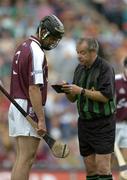 31 July 2005; Shane Kavanagh, Galway, has his name taken by referee Aodan MacSuibhne. Guinness All-Ireland Hurling Championship, Quarter-Final, Galway v Tipperary, Croke Park, Dublin. Picture credit; Brendan Moran / SPORTSFILE