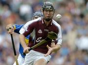 31 July 2005; Tony Og Regan, Galway, in action against Eoin Kelly, Tipperary. Guinness All-Ireland Hurling Championship, Quarter-Final, Galway v Tipperary, Croke Park, Dublin. Picture credit; Brendan Moran / SPORTSFILE