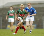 30 July 2005; Ciaran McDonnell, Mayo, in action against, Cavan. Bank of Ireland Football Championship qualifer, Round 4. Mayo v Cavan, Dr. Hyde Park, Roscommon. Picture credit; Matt Browne / SPORTSFILE