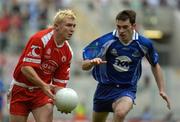 6 August 2005; Owen Mulligan, Tyrone, in action against Colm Flanagan, Monaghan. Bank of Ireland All-Ireland Senior Football Championship Qualifier, Round 4, Tyrone v Monaghan, Croke Park, Dublin. Picture credit; Damien Eagers / SPORTSFILE