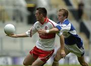 6 August 2005; Eoin Bradley, Derry, in action against Joe Higgins, Laois. Bank of Ireland All-Ireland Senior Football Championship Qualifier, Round 4, Laois v Derry, Croke Park, Dublin. Picture credit; Damien Eagers / SPORTSFILE