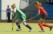 7 August 2005; Ciara O'Brien, Ireland, in action against Margaux Grossen, Belgium. International Hockey Friendly, Ireland v Belgium, UCD, Dublin. Picture credit; Matt Browne / SPORTSFILE