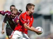 7 August 2005; Kevin MacMahon, Cork, in action against Michael Donnellan, Galway. Bank of Ireland Senior Football Championship Quarter-Final, Galway v Cork, Croke Park, Dublin. Picture credit; David Maher / SPORTSFILE