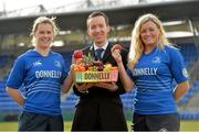 27 February 2014; Donnelly, Ireland’s leading fresh fruit and vegetable supplier, has been announced as the official new sponsor of the Leinster Women’s Rugby Team.The three year sponsorship deal will see the Donnelly logo appear on the Leinster Women’s Rugby team jersey as well as on items of the match-day and non-match-day training kit. Donnelly will also maximize the sponsorship through above-the-line and below-the-line promotional campaigns entitled ‘Powering the Mighty’ which will involve a complete marketing and PR campaign across Online, Social, and Print, as well as a high level of involvement at all levels of Leinster Women’s Rugby. Pictured are Leinster players Sharon Lynch, right, and Fionnuala Gleeson with Alan Waters, Marketing Manager, Donnellys. Donnybrook Stadium, Donnybrook, Dublin. Picture credit: Matt Browne / SPORTSFILE