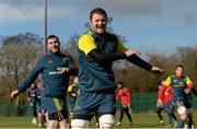 27 February 2014; Munster's Donnacha Ryan and JJ Hanrahan, left, warm up during squad training ahead of their Celtic League 2013/14, Round 16, game against Scarlets on Saturday. Munster Rugby Squad Training, Cork Institute of Technology, Bishopstown, Cork. Picture credit: Diarmuid Greene / SPORTSFILE